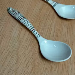 Sarvah Melamine 12 Inch Black And Red Line Designed Solid Spoon (Single Piece)- White